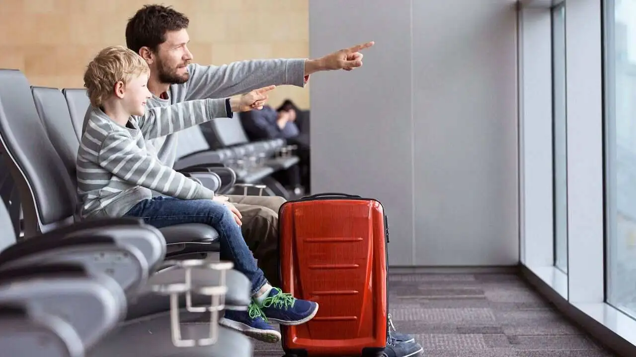 Visitors getting airport gate passes at a U.S. airport security checkpoint
