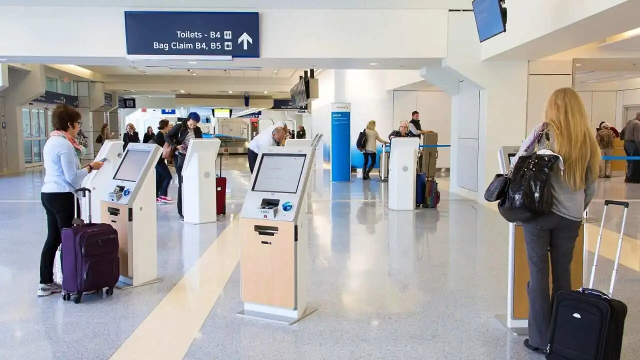 DFW Terminal B at Dallas Fort Worth International Airport showing gates and passenger area