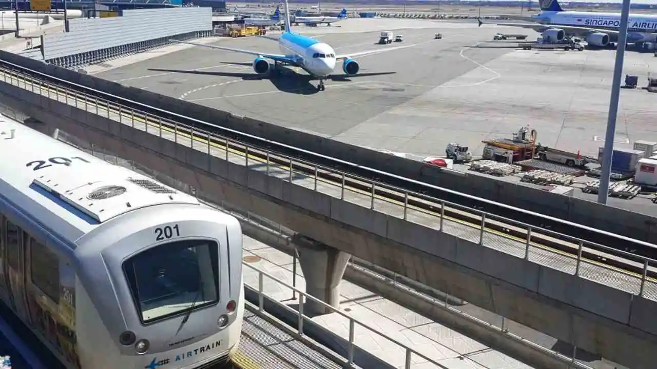Transportation options at John F. Kennedy International Airport (JFK), including AirTrain, taxis, ride-sharing, and shuttle services